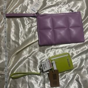 Two cute colorful wristlets Steve Madden and a new day